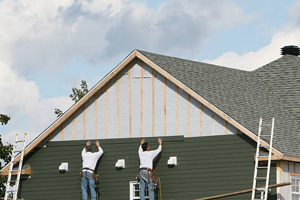 Professional Siding Contractor technician working in Manor, PA